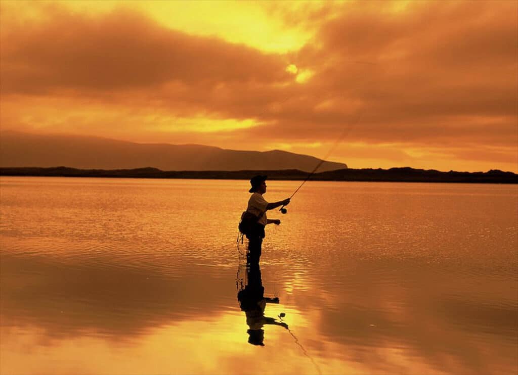 A man with the fishing rod