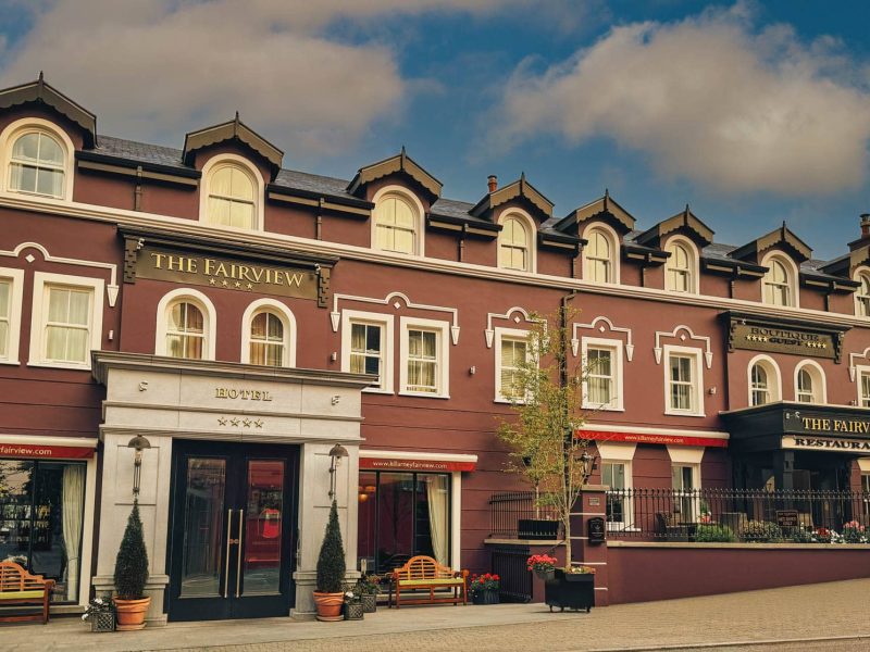 Daytime exterior of the Fairview Boutique Hotel with main entrance, windows and street frontage.